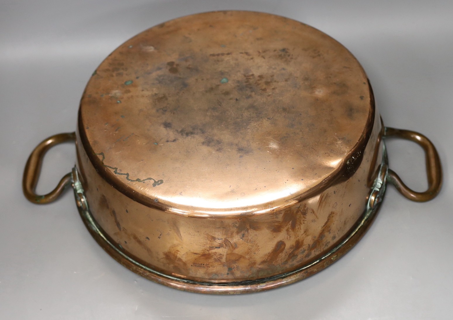 A 19th century copper two handled preserving pan, 51cms handle to handle